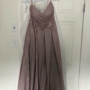 Evening dress , thin straps shiny slit infront very classy. Wore once